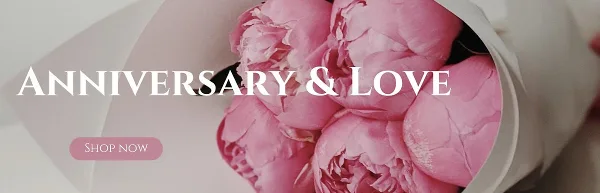 A close-up photograph of a bouquet of pink peonies wrapped in white paper.