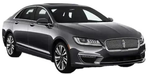 A dark gray Lincoln sedan viewed from the front three-quarter angle, featuring a chrome grille and alloy wheels.