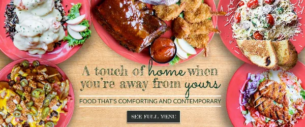 A collage of various plated food dishes including ribs, fried shrimp, salad, and other entrees.