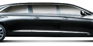 Side profile of a black luxury sedan on a black background
