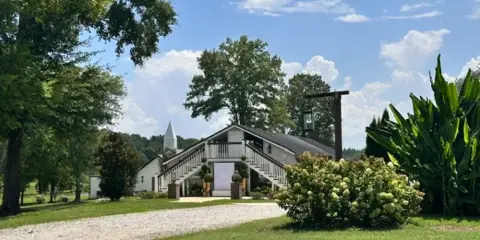 Exterior view of the Dodson Farm event venue and chapel building