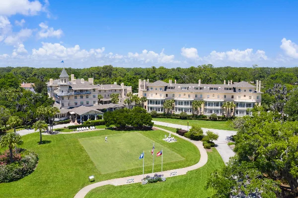 Aerial view of the Jekyll Island Club Resort clubhouse and manicured grounds