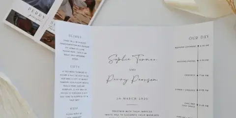 Modern tri-fold gatefold wedding invitation open on linen, Paperlust gatefold invitation design