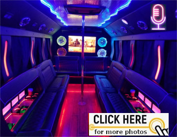 Interior of a party bus featuring purple and blue LED lighting, bench seating, and a dance floor.