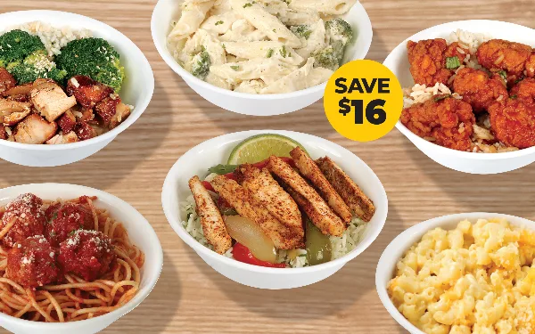 An assortment of prepared food bowls including pasta, chicken, and mac and cheese, representing catering options.