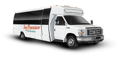 A white shuttle bus with San Francisco Charter Buses branding parked on a black background.