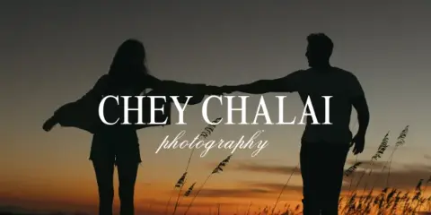 Silhouette of a couple holding hands at sunset with text overlay reading 'CHEY CHALAI photography' and 'Georgia + Destination Wedding and Couples Photographer'.