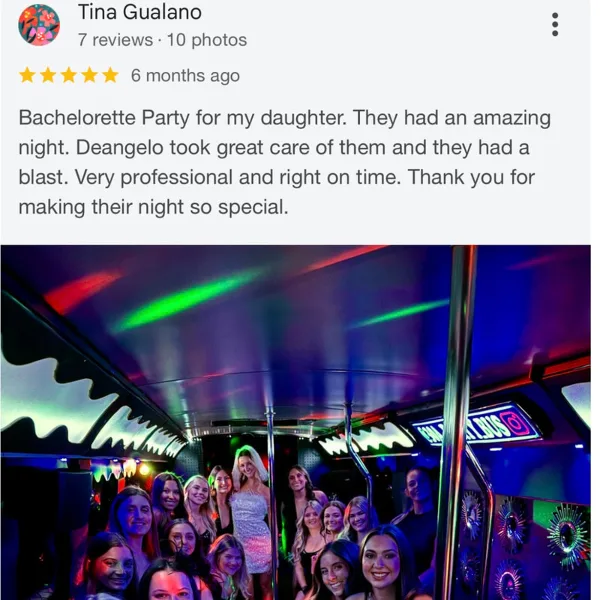 Interior of a party bus with a group of people and colorful lighting.
