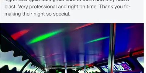 Interior of a party bus with a group of people and colorful lighting.
