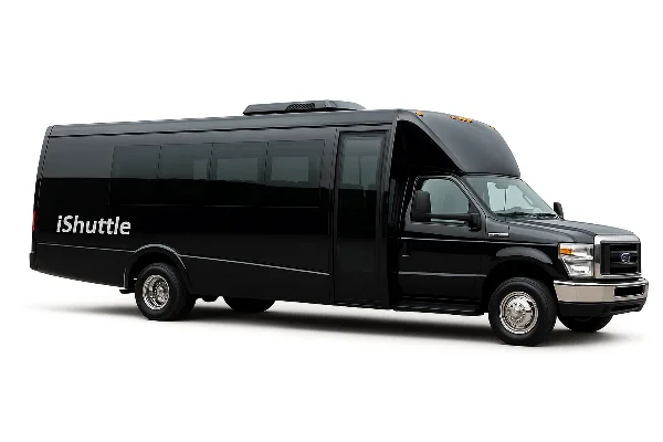 A black iShuttle shuttle bus parked against a white background.