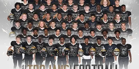 A professional group portrait of the 2021 Trojans Football team, featuring players and coaches in uniform.