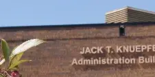 Exterior view of the Jack T. Kuepfer Administration Building, a brick courthouse structure.