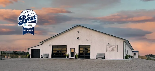 Exterior view of the Sunset Hill Event Center building at dusk