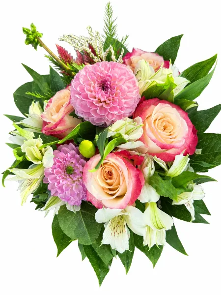 A close-up of a mixed flower arrangement featuring pink and peach roses, a large pink dahlia, and white alstroemeria with green foliage.