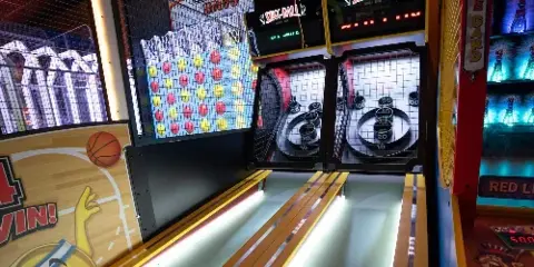 Interior view of The Dakota Center's FunZone arcade featuring Connect 4 Hoops and Skee-Ball games.