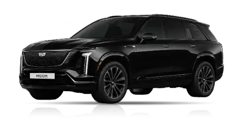Black Cadillac Vistiq SUV with MIUUM license plate on a dark background