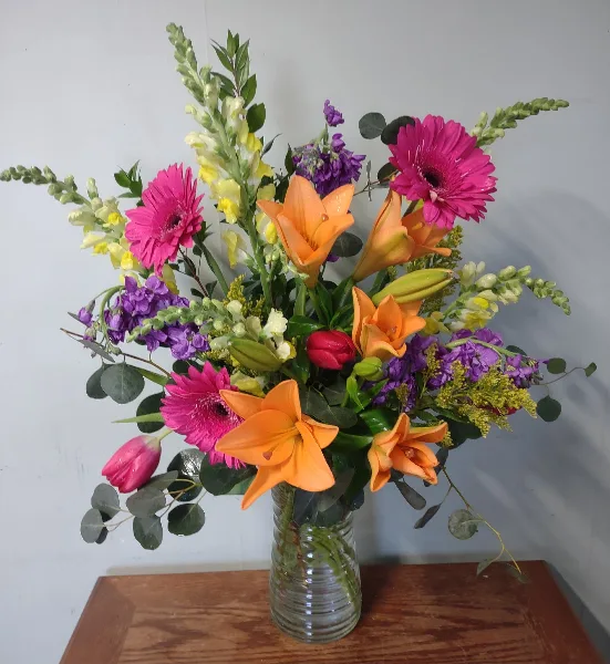 Fresh flower arrangement by Buds & Blooms Florist