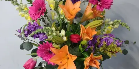 Fresh flower arrangement by Buds & Blooms Florist