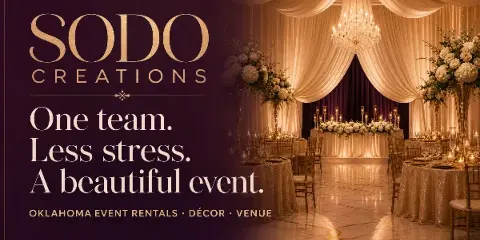 Decorated event venue with tables, chairs, floral arrangements, and draping, featuring SODO Creations branding.