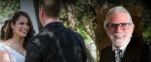 A wedding ceremony featuring a bride and groom with an officiant in an outdoor setting.