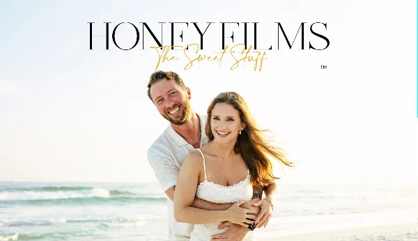 A smiling couple embracing on a beach with the Honey Films logo overlaid.