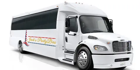 A white shuttle bus with 'Jacks Party Bus' branding on the side.