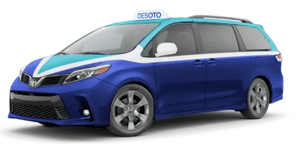 A blue and white DeSoto Cab taxi van with a roof sign, parked on a white background.