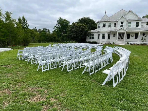White resin table set-up by Wiregrass Event Rentals