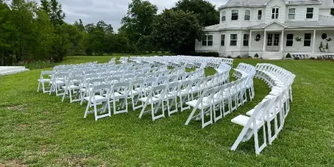 White resin table set-up by Wiregrass Event Rentals