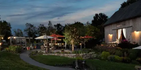 HayLoft In The Grove barn wedding venue at night, WNY