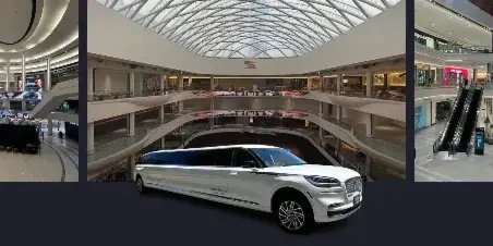 A white luxury limousine parked inside a large, modern indoor mall atrium.