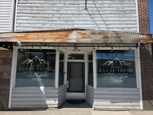 Exterior storefront of Montana Event Thyme catering and planning business with branded windows and entrance