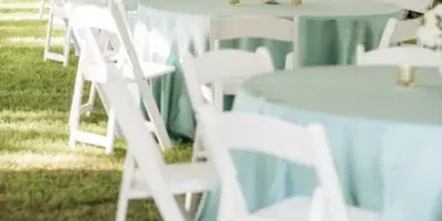 Lagoon and Amour event tables, chairs, and linens